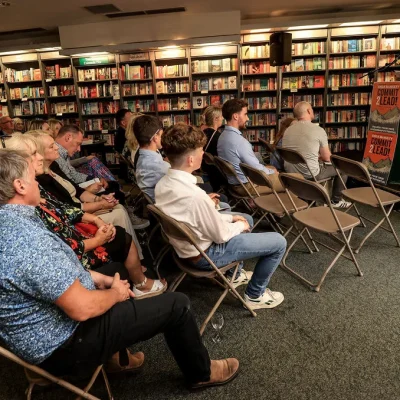 Audience at Hodges Figgis listens attentively during a book talk on leadership.